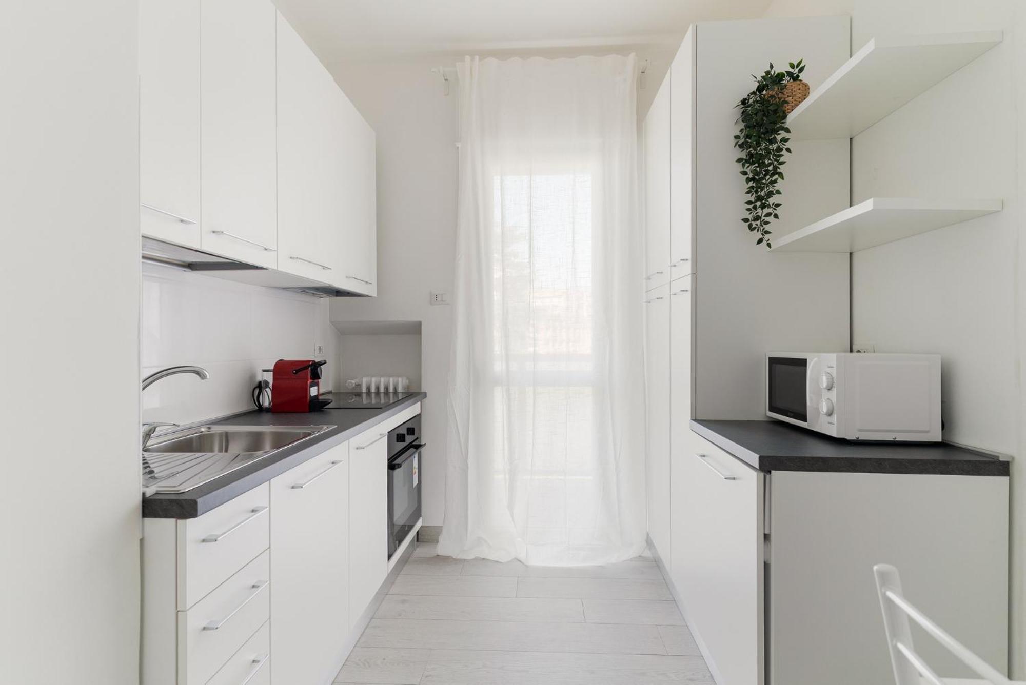 Guesthost - Piazza Tripoli Bright Apartments - Milan — Photos 2